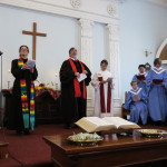 Church altar filled with ministers and choir