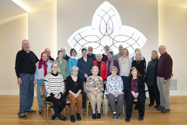 Canaan Congregational Church congregants in front of the new church window