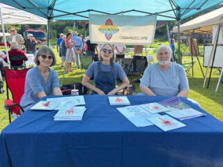 The Three Amigos from Canaan UCC were on hand greeting neighbors and giving away free trivets from the Church's 175th Anniversary Celebration in 2004.