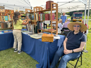 Librarium owner Sharon Lips set up shop with a miniature book store display to the delight of attendees both young and old.