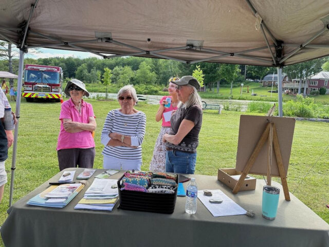 Our Senior Program volunteers were in attendance, staffing the table, providing information and offering their own handmade potholders for sale.